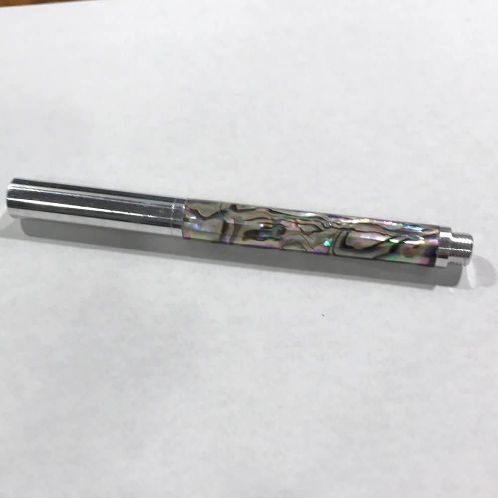 Handmade pen.  Unfinished (raw) aluminum and mother of pearl (abalone).